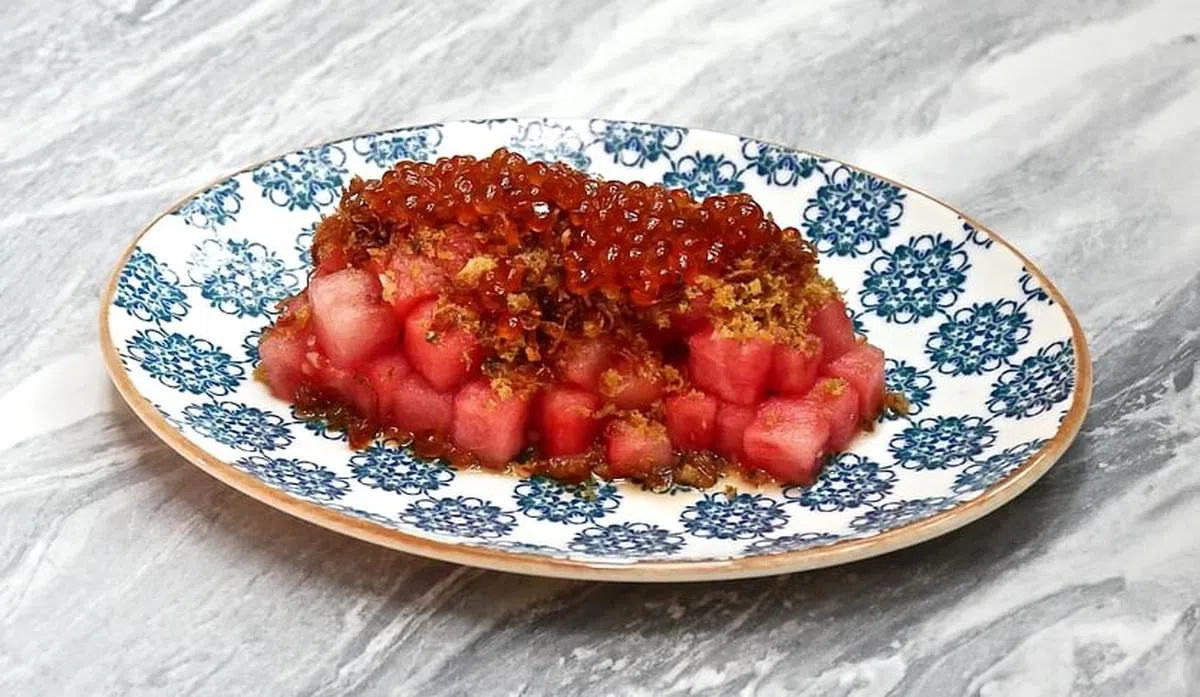 清爽开胃菜腌西瓜。（餐馆提供）
