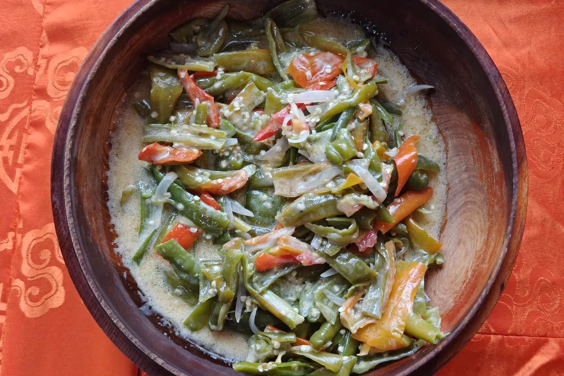 如果说泡菜是韩国人的灵魂，那辣椒奶酪就是不丹人餐桌上的命脉。（陈默汎摄）