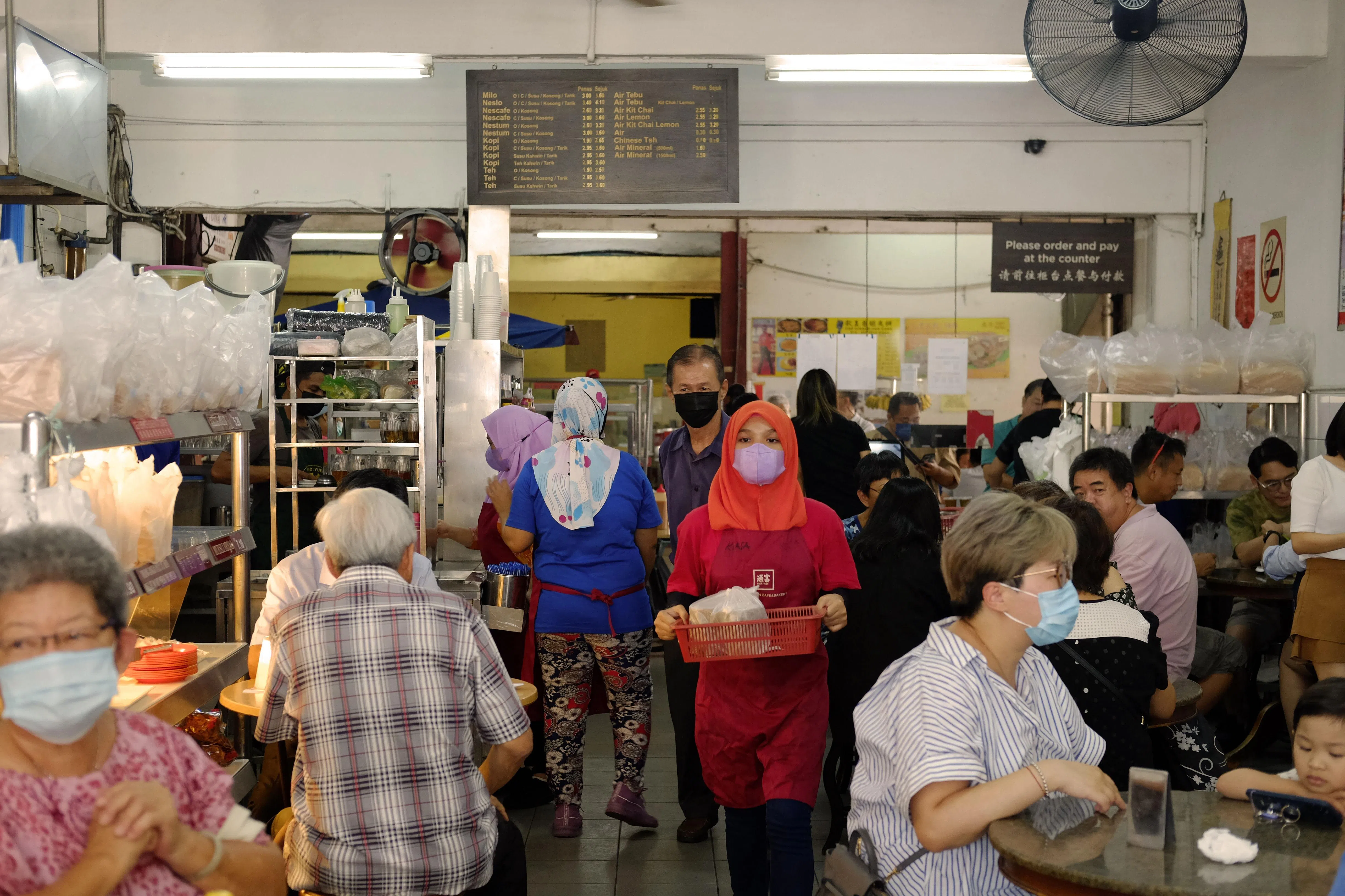亚庇人的日常。（林道锦摄）