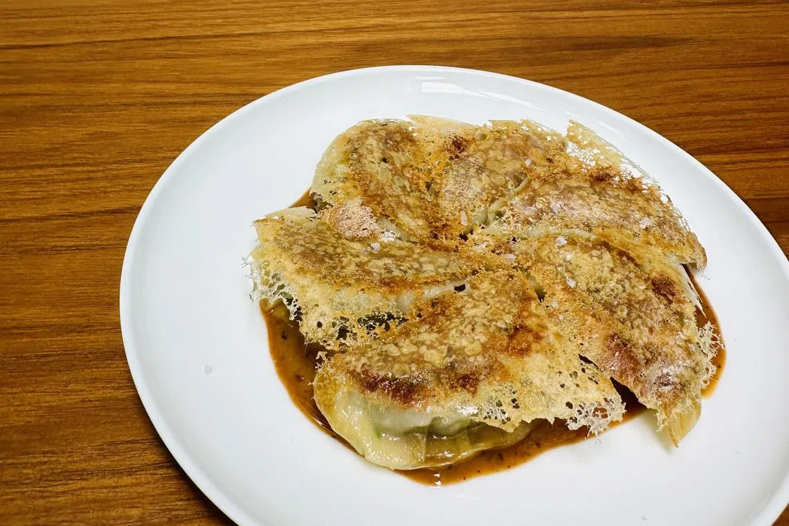 黄鳍金枪鱼虎虾饺子内馅丰富。（酒店提供）