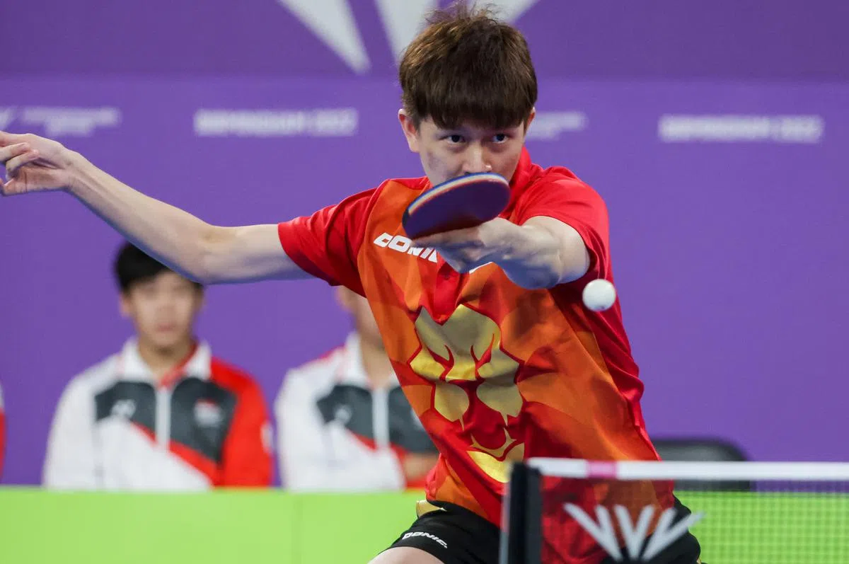 周哲宇对垒世界排名比自己高接近100位的强敌拿下首局。（叶振忠摄）