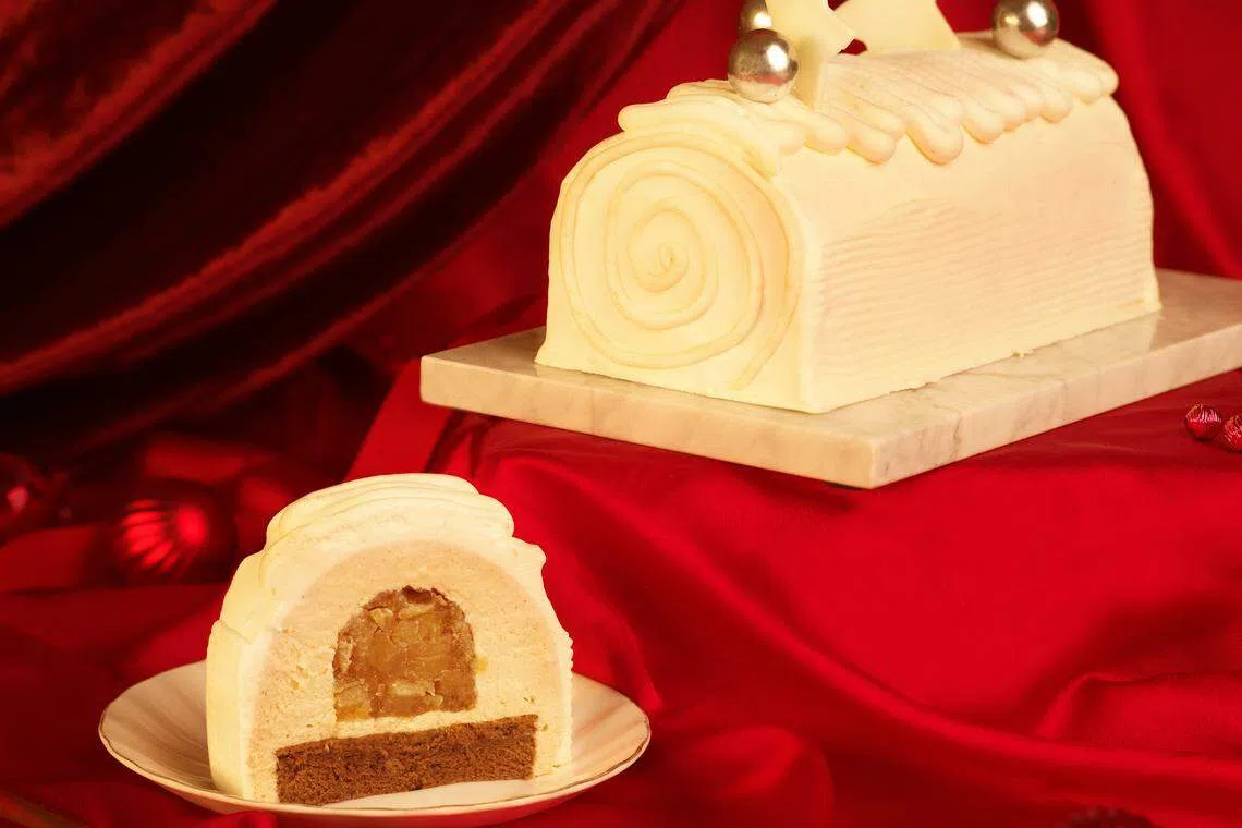 苹果肉桂树桐蛋糕营造白雪皑皑的圣诞氛围。（品牌提供）