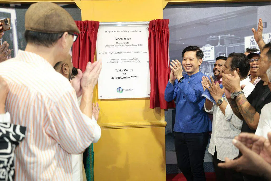 贸工部兼文化、社区及青年部政务部长陈圣辉（蓝衣）星期六在竹脚中心重启仪式上致辞时说，中心完成三个月的维修和粉刷工程，食客和居民接下来可享有更清洁和舒适的环境。（李冠卫摄）