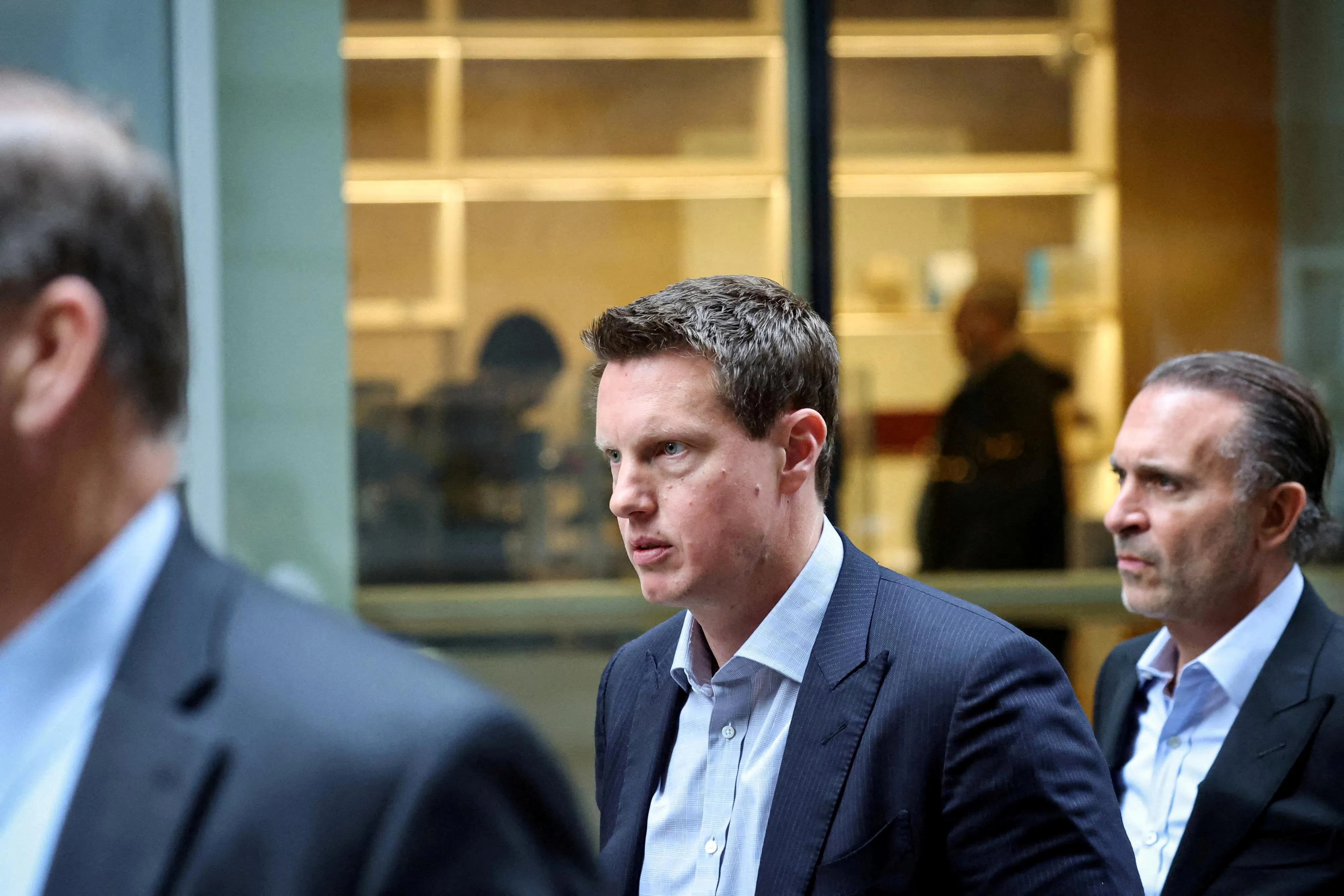 派拉蒙执行长David Ellison（中）。（路透社）