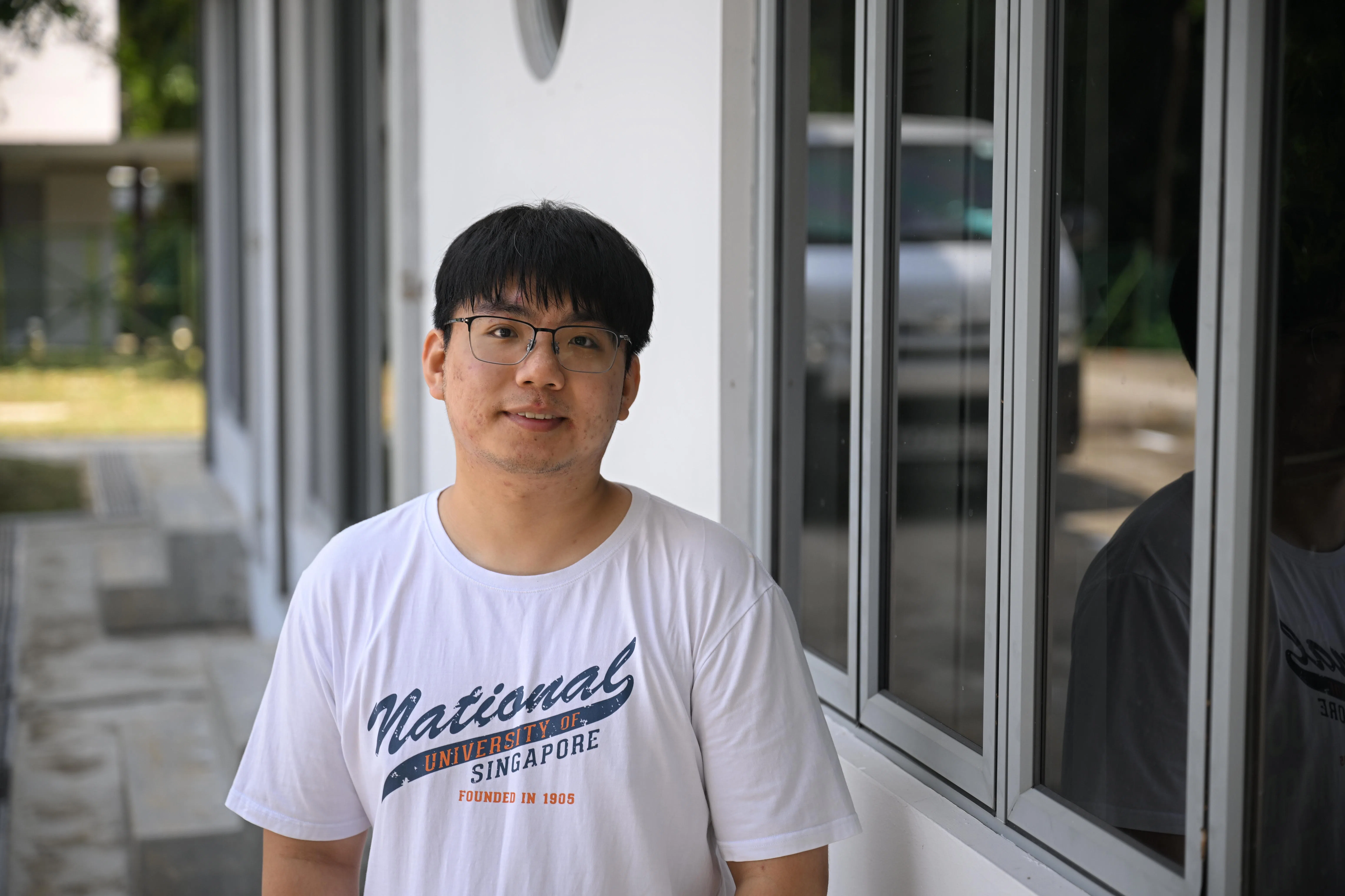 国大计算机学院一年级博士生余昭辰，是雷蛇—国大人工智能联合研究室约20名成员之一。（海峡时报）