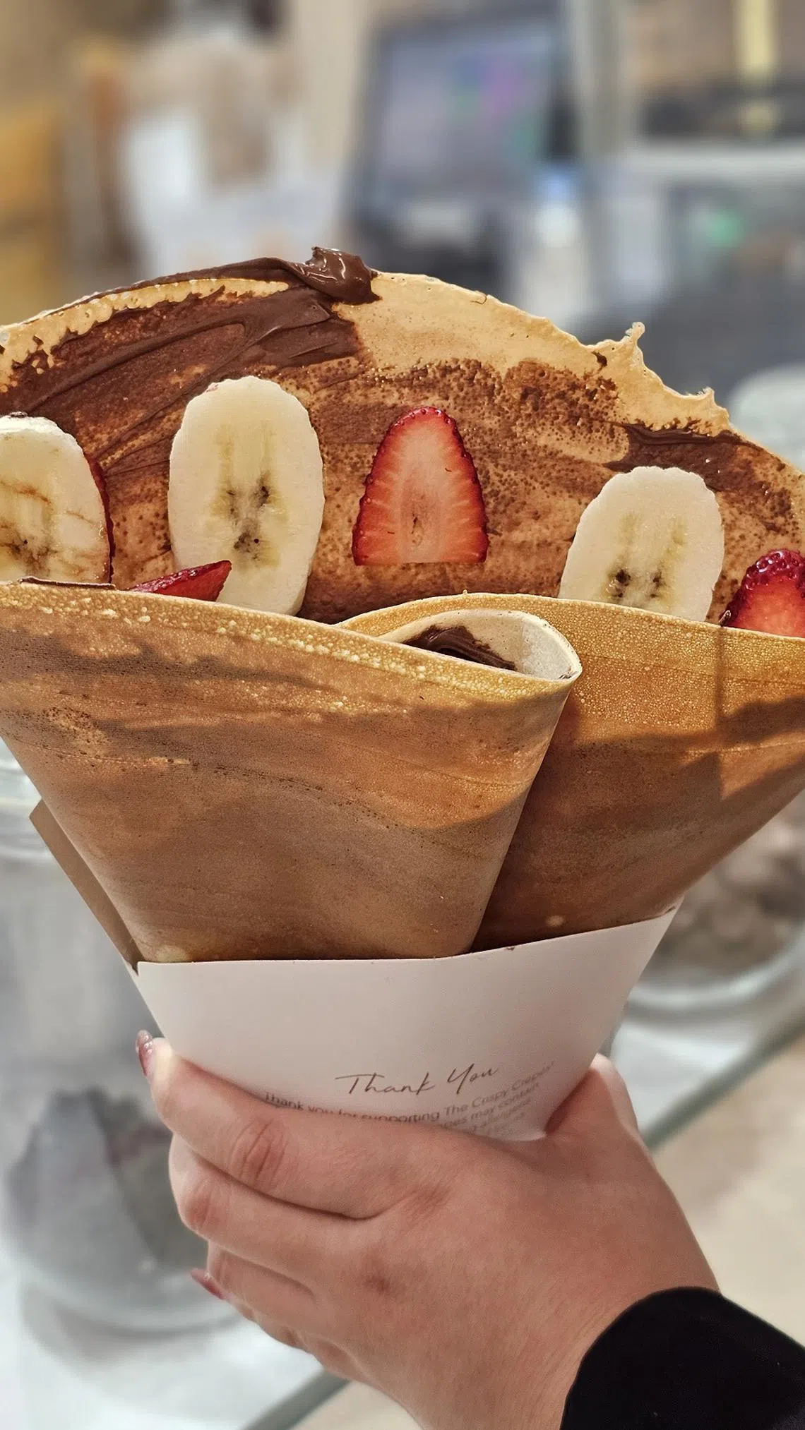 榛果酱配草莓香蕉的可丽饼。（黄亿敏摄）