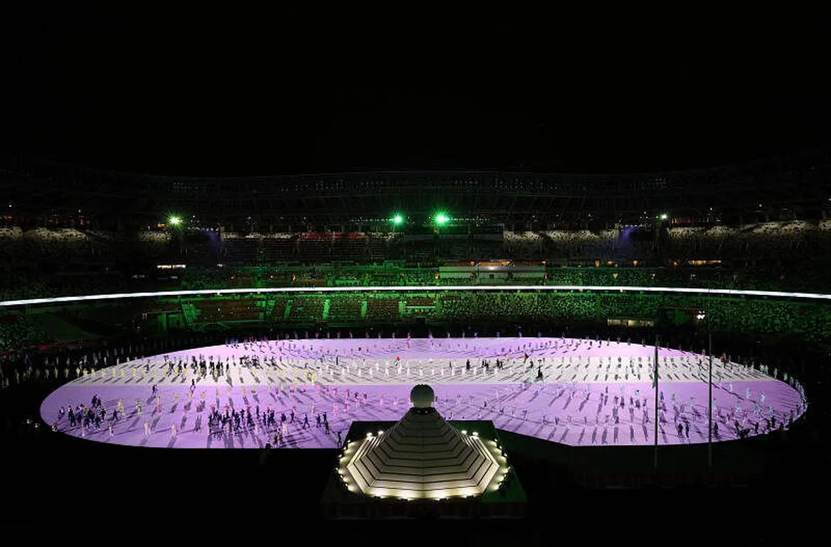 东京奥运体育场上的表演者。（路透社）