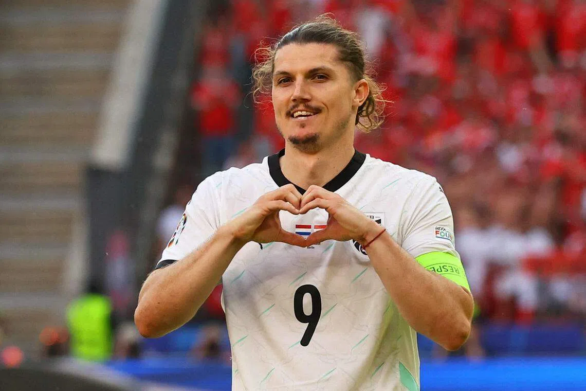 奥地利中场萨比策尔助球队在小组赛成为盟主。（路透社）