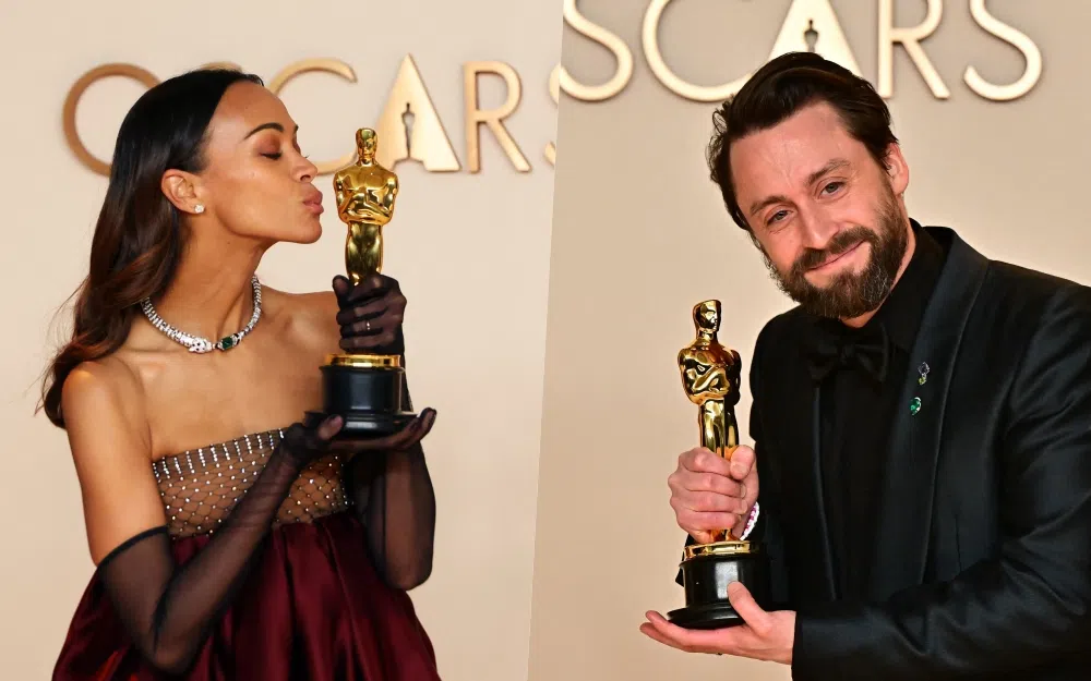 第97届奥斯卡最佳男女配角奖分别由Zoe Saldaña（左）及Kieran Culkin（右）夺下。（路透社）