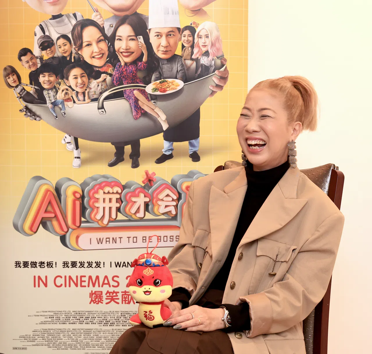 莫小玲不介意家里有个长得像韩星的机器人。（周国威摄影）