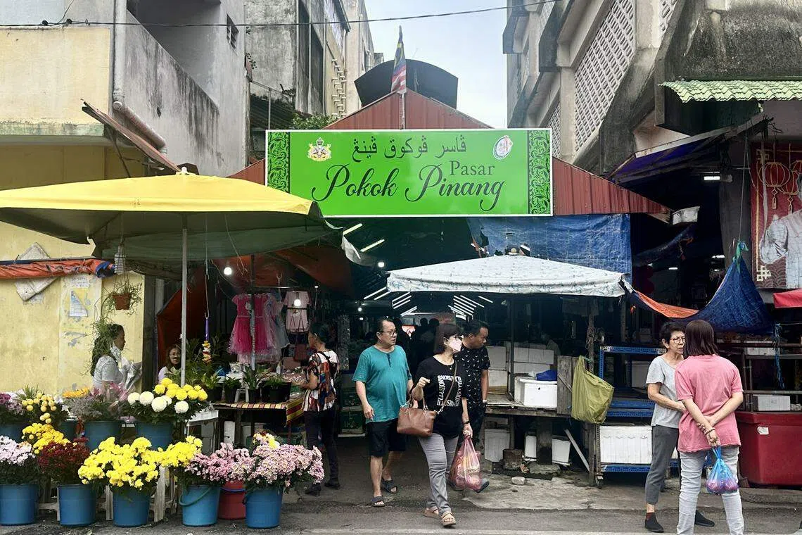 哥打峇鲁华人买卖猪肉的湿巴刹，当地人称为“肉店”。（陈雅恩摄）