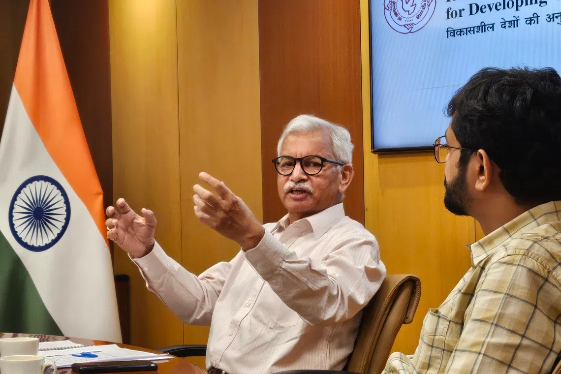 印度智库“发展中国家研究和信息系统”杰出研究员吉拉夫（左）预计，印度与美国将在这一两个月内达成贸易协定。（廖慧婷摄）