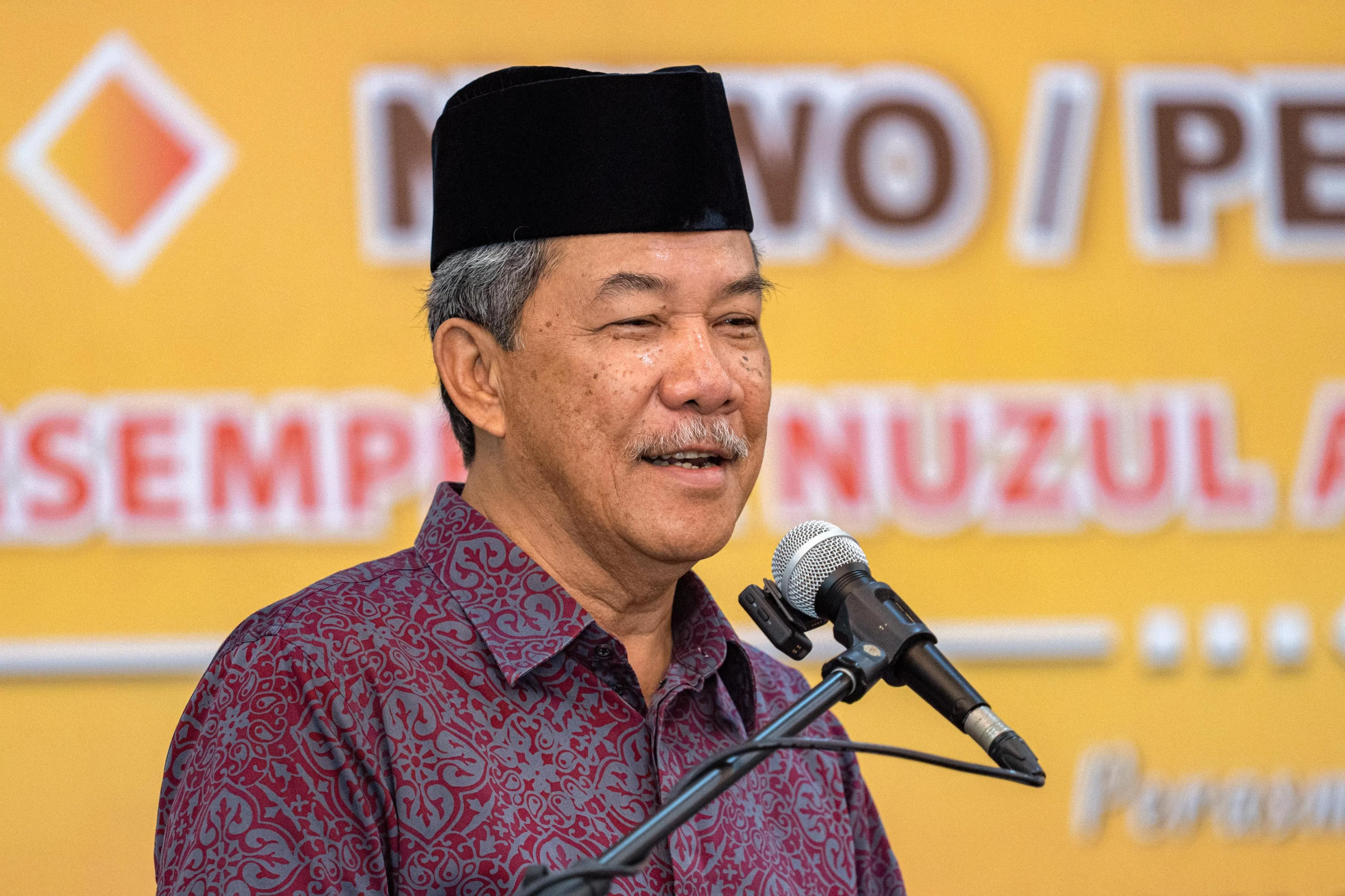 巫统署理主席莫哈末哈山星期六（3月7日）说，巫统领导的国阵来届大选将参选至少115个国会议席，这是为了向选民展现国阵组建政府的决心。（马新社）