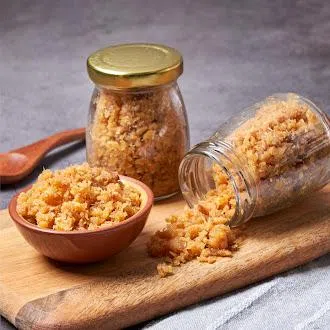 吴杰敏夫妻将吴家的家传香脆咸鱼松开发为可量产的即食产品。（Tankfully Fresh提供）