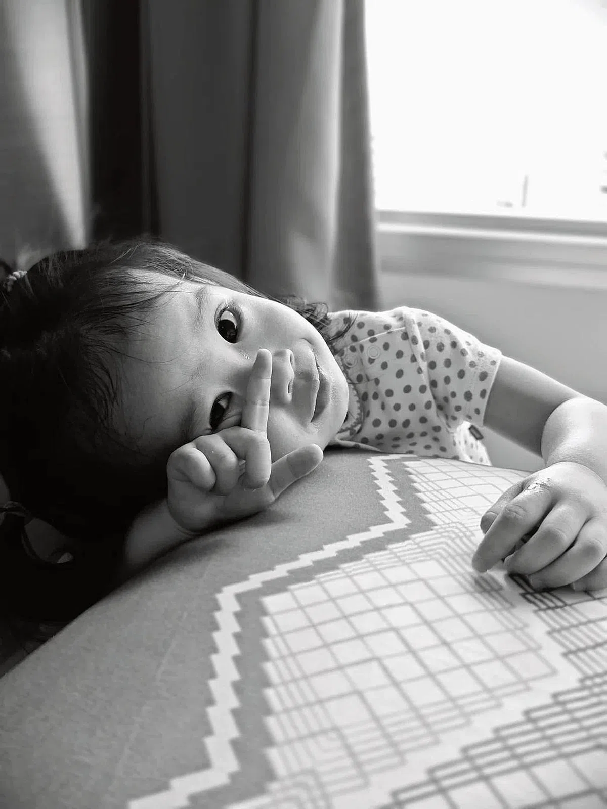 黑白人像照在徕卡摄影色调下特别有感染力，很好地突出人物神态。（黄少伟摄）