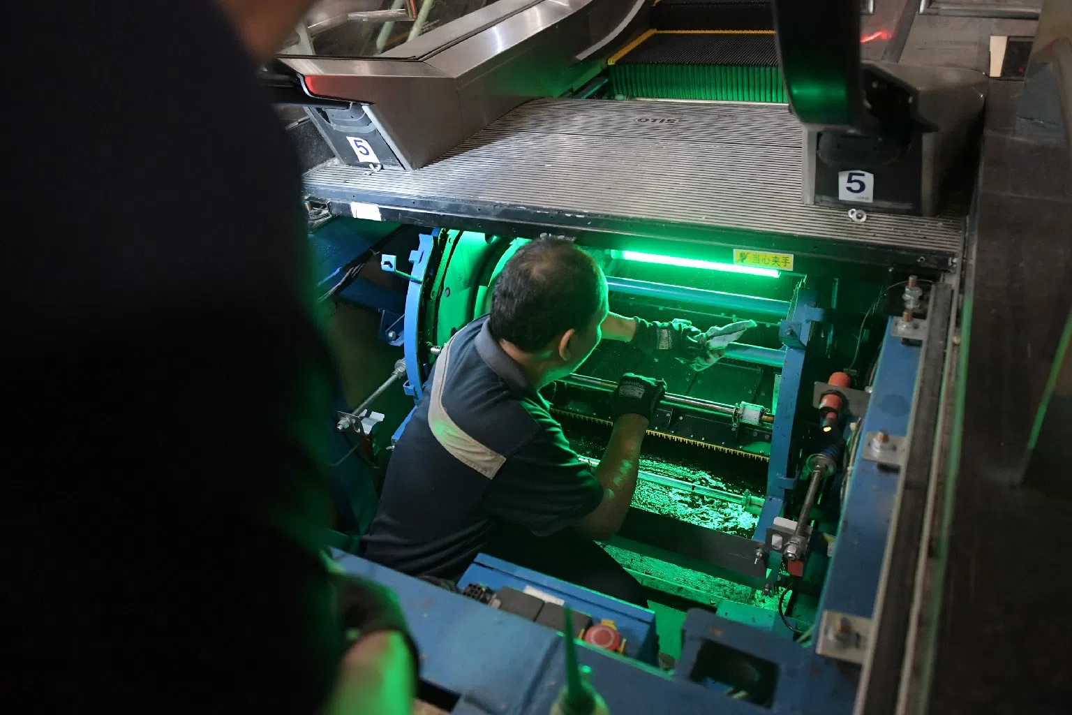 清洁工、保安员，以及电梯与电动扶梯维修专员等职业，均已纳入渐进式薪金模式（PWM）覆盖范围。（图/新报业媒体）