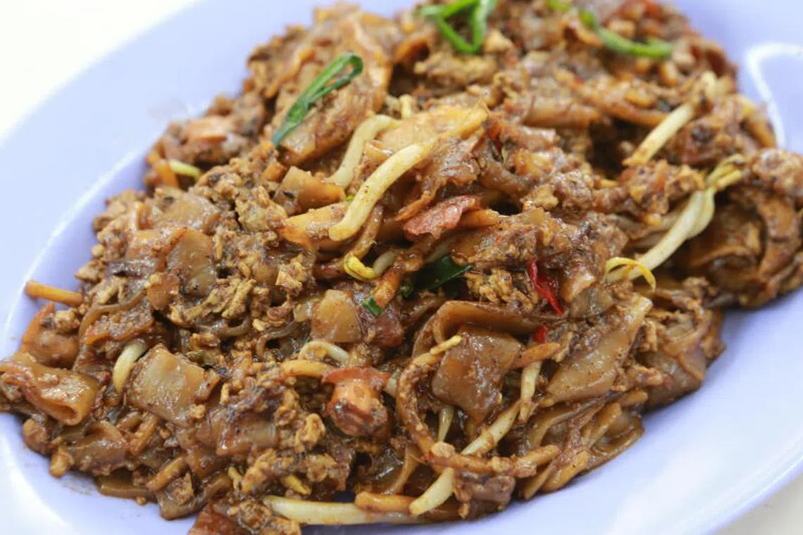 亚米尼亚街炒粿条镬气十足，粿条色泽油亮，顺滑爽口。（档案照）