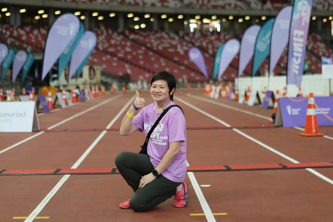 Image 20: 癌症康复者涂优金，为参加新加坡防癌协会举办的“为生命接力”，从3月14日到15日，度过了一个不眠之夜。（梁麒麟摄）