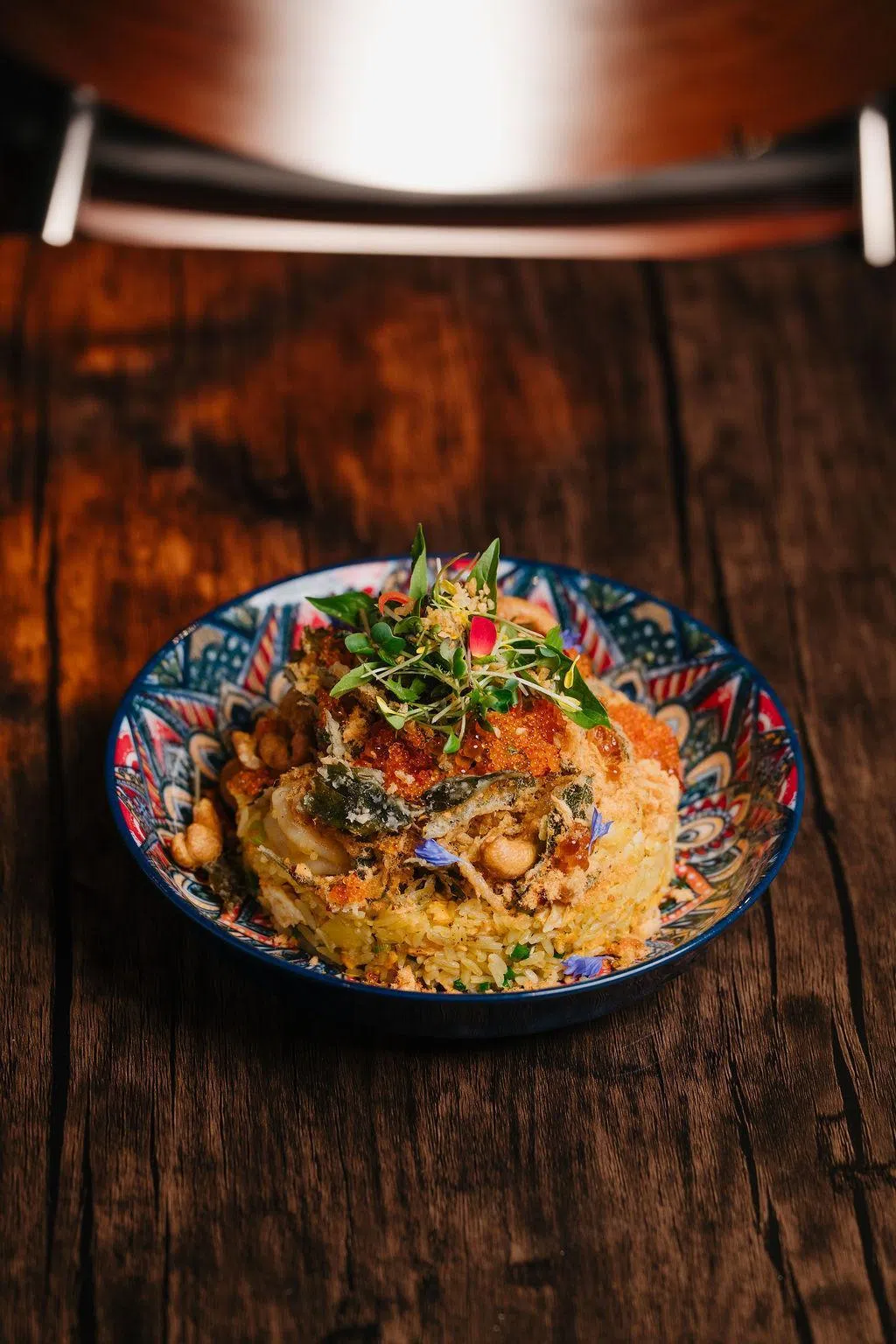 Fi Woodfire Thai的黄梨饭配料丰富，口感酸甜丰富。（餐馆提供）