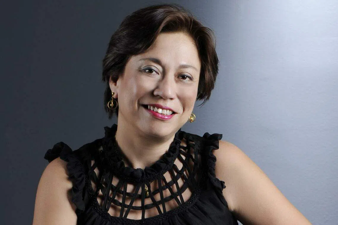 《海峡时报》前副总编辑默乐说，她是通过吴振华朋友的介绍，受邀加入吴振华的团队。（海峡时报）