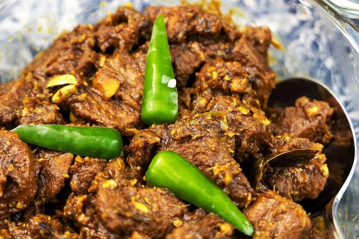 孟加拉式的羊肉咖喱。（张思庆摄）