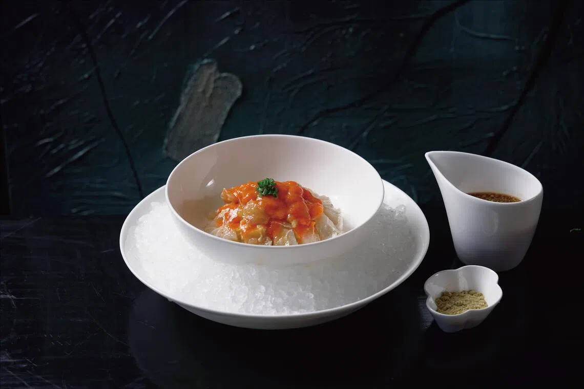 温州江蟹生，选用鲜活梭子蟹腌制而成，口感冰爽，鲜味十足。（餐馆提供）