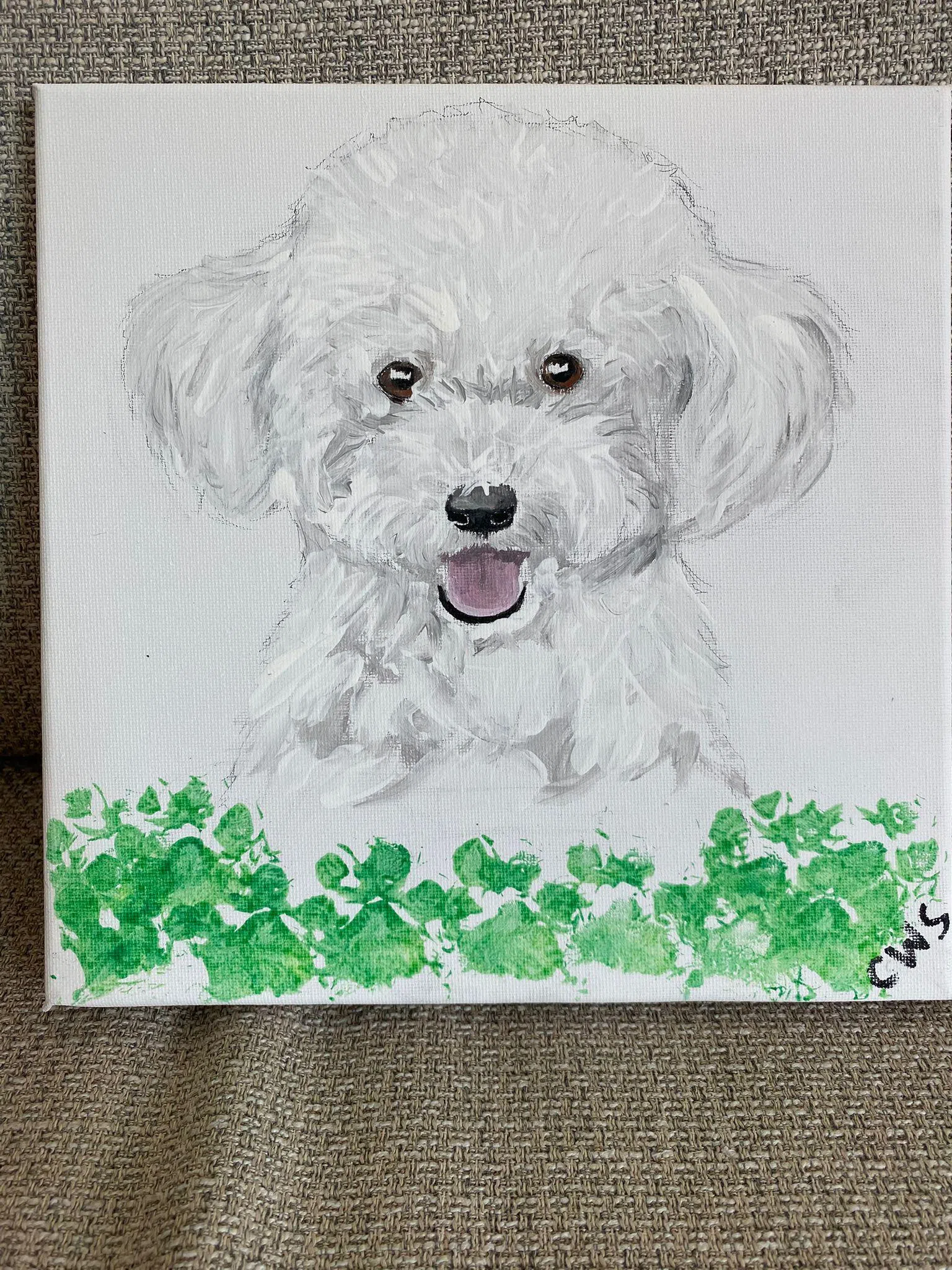 王玉珠的儿子天资聪颖，学业成绩优异，有绘画天分，这是他为家中爱犬作画。（受访者提供）