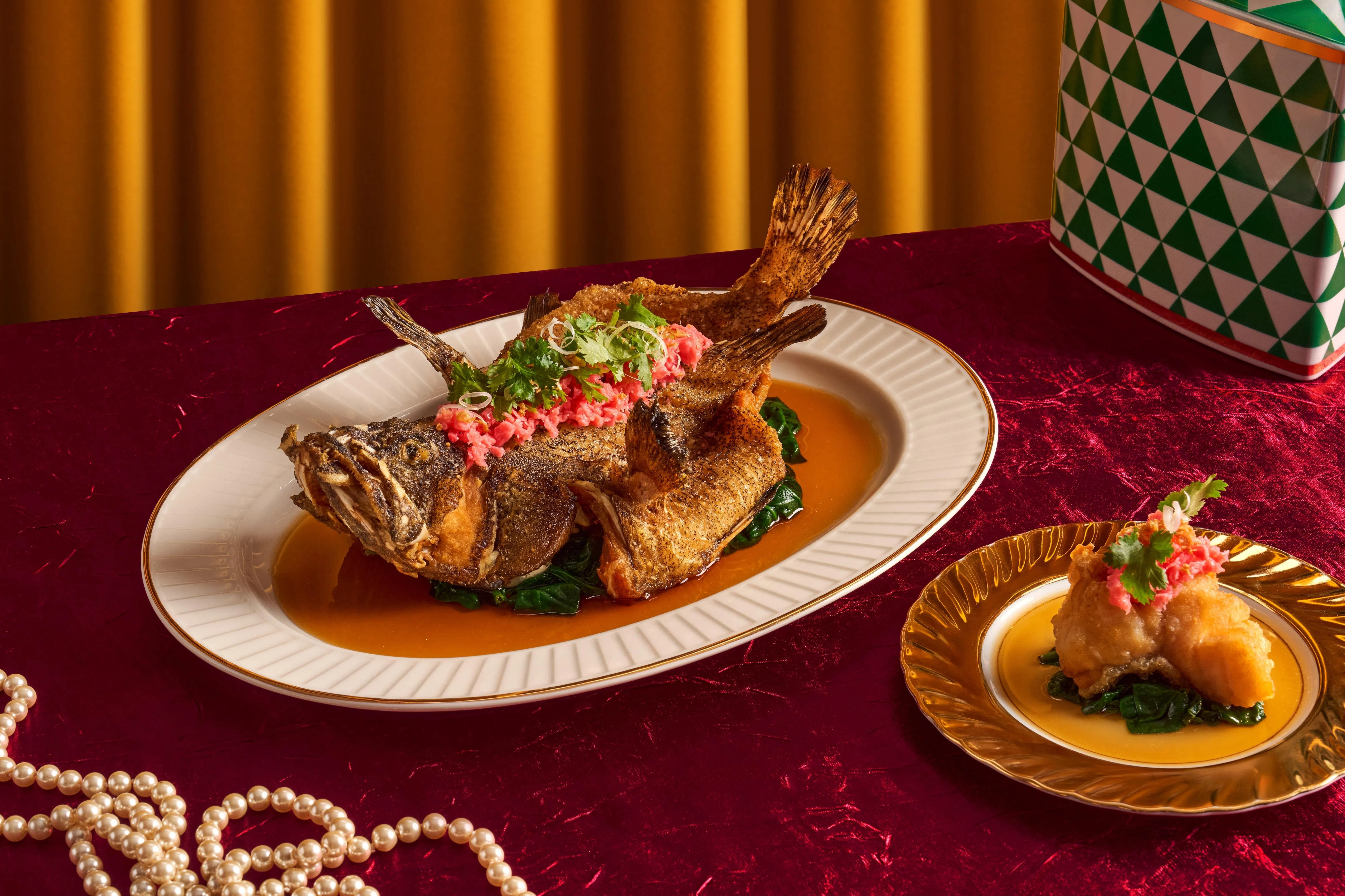 脆炸龙虎斑鱼外层香脆，内里细嫩。（餐馆提供）