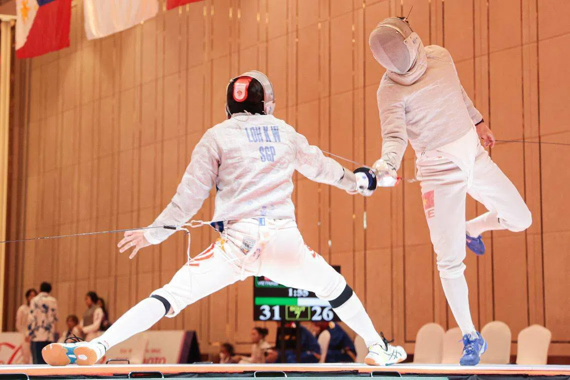 我国男队史上首次打入男子佩剑团体决赛，最后登场的罗凯玮顶住对手反扑获得最终胜利。（李冠卫摄）