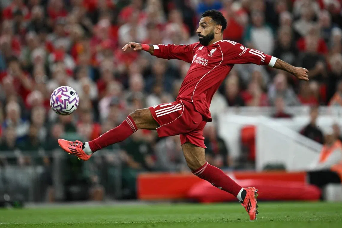 萨拉赫在对阵伯恩茅斯的英超揭幕战攻入一球，使他在英超的总进球数达到187个，并列历史第四，距离排名第三的曼联名宿鲁尼还差21球。（法新社）