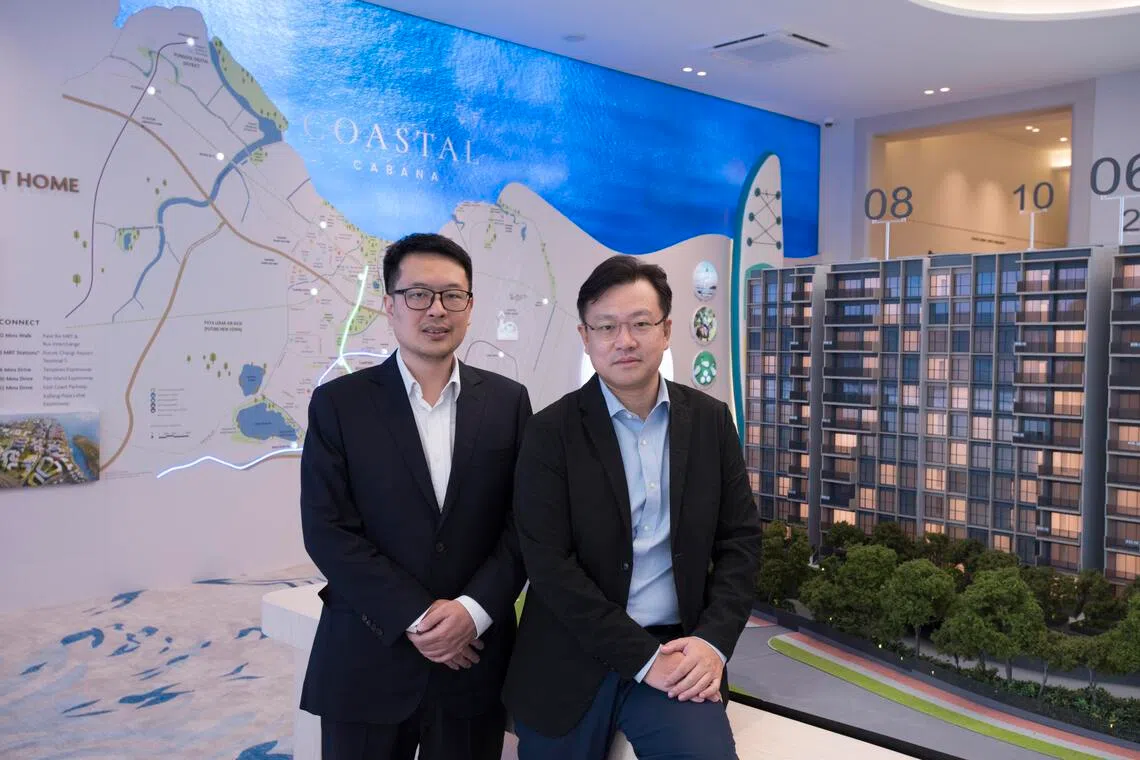 四海控股董事王昕（左）与青建地产董事欧阳晶认为EC是新加坡重要和有意义的住屋类别，也对Coastal Cabana的设计和质量能引起买家兴趣有信心。（特约伍书永摄）