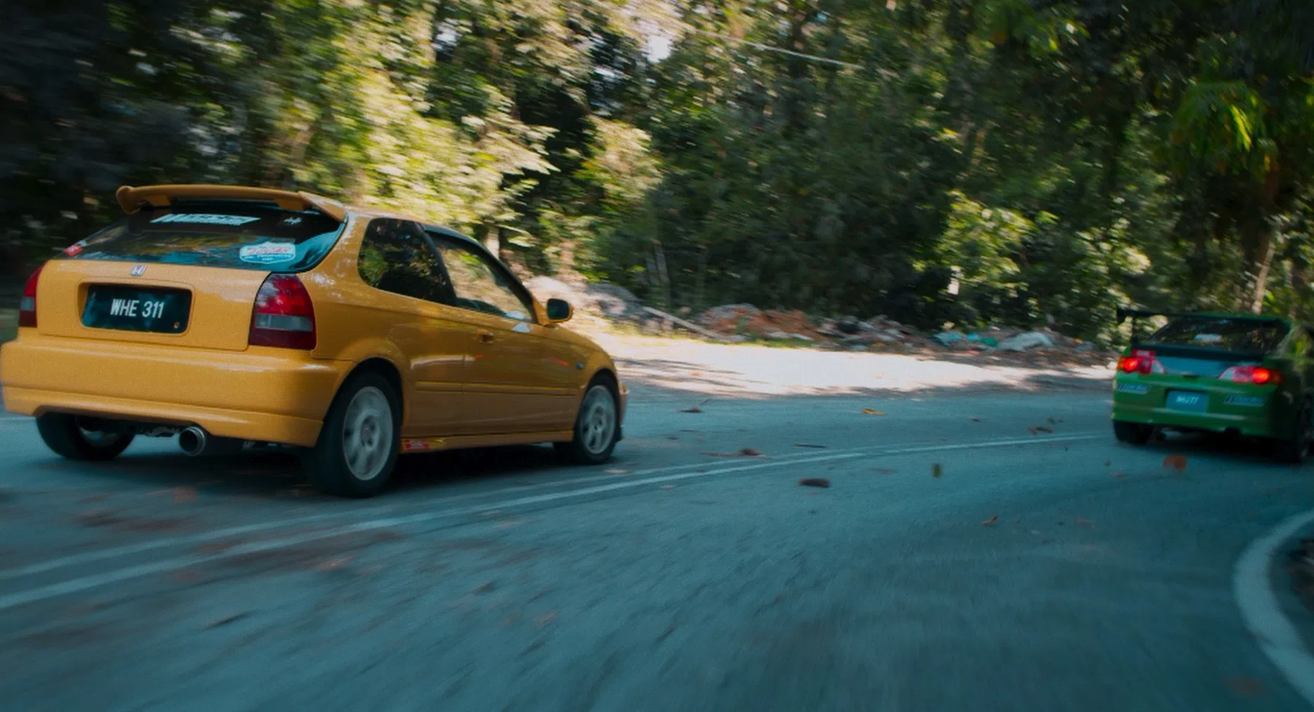 片中的赛车画面都是真枪实弹。（雷坚钦提供）