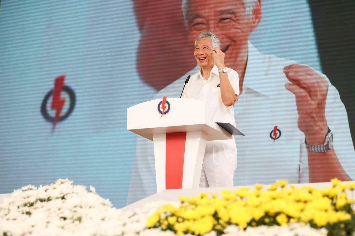 李显龙总理呼吁人民行动党党员在怀念已故建国总理李光耀的同时，也必须让新加坡继续进步和繁荣昌盛。（陈斌勤摄）