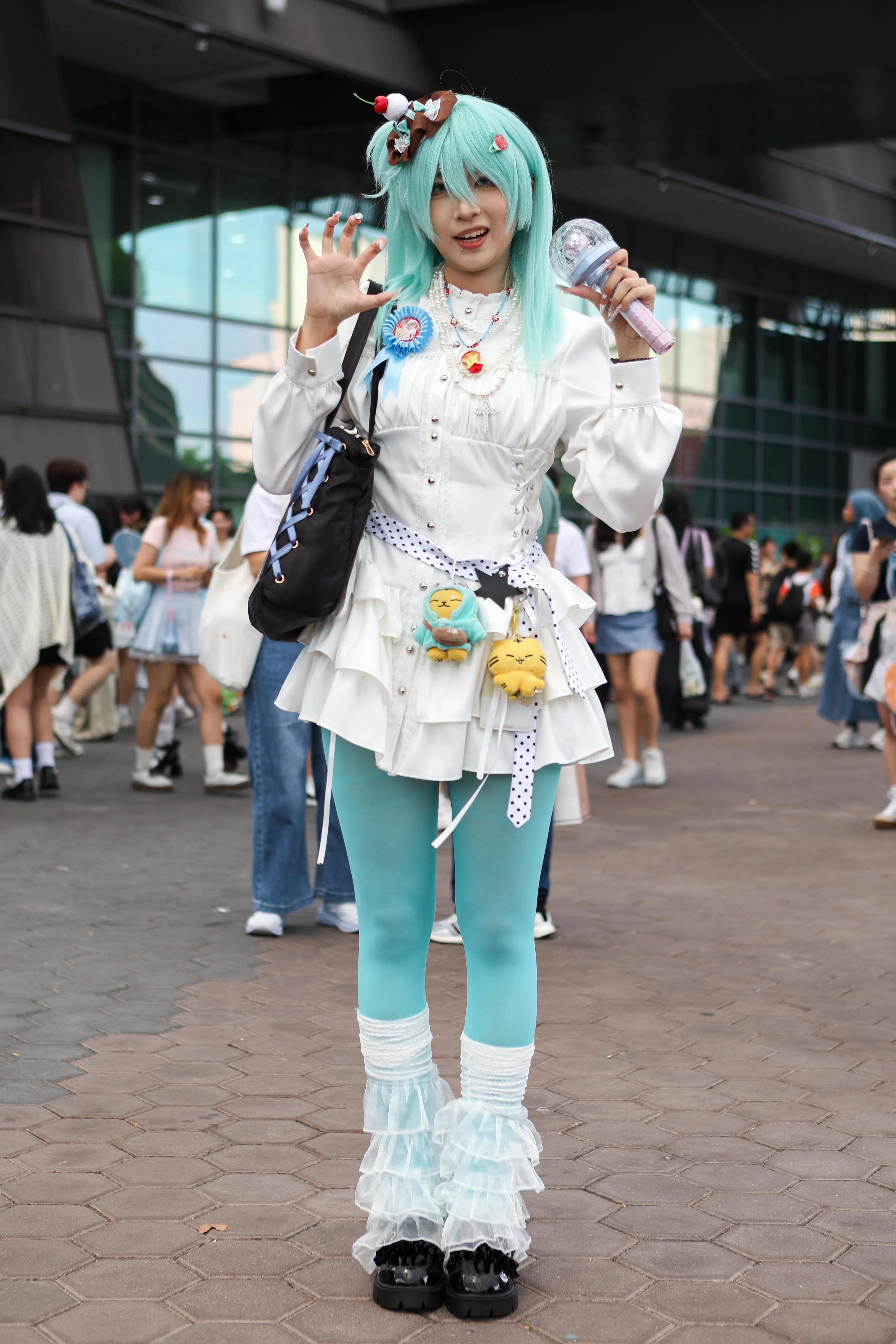 来自中国的“苹果鼠”设计了原创角色，第一次到新加坡看演唱会。（特约摄影李姿仪）