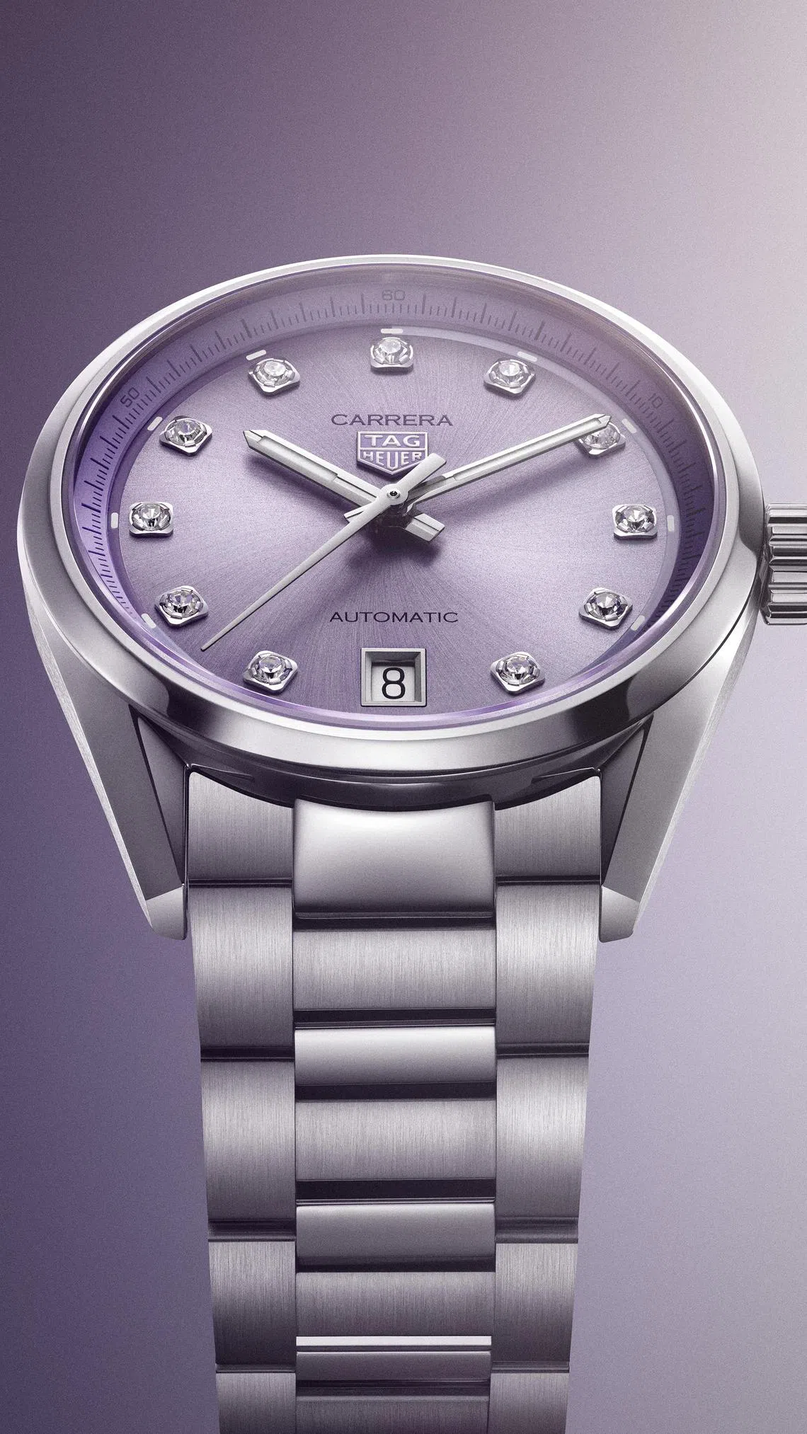 36毫米全新卡莱拉日历型腕表，色彩柔美，11颗钻石时标低调奢华。（泰格豪雅提供）