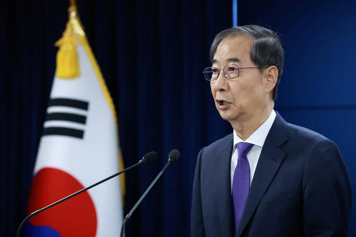 韩国代总统韩悳洙周四宣布辞职。（路透社）