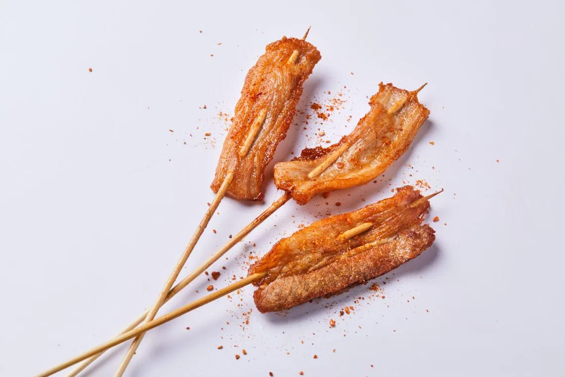 咸香的五花肉炸串。（餐馆提供）