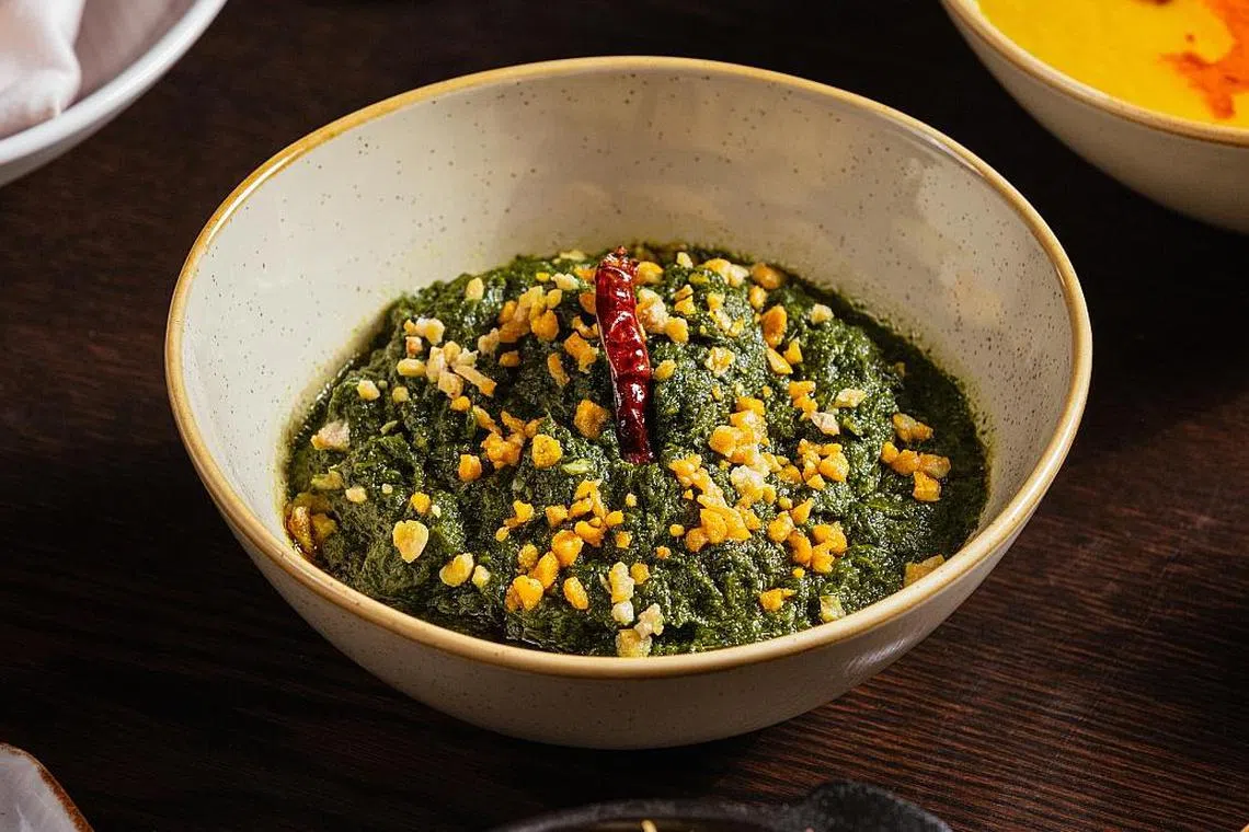 SanSara的有机菠菜料理ghee palak laashuni口感浓郁。（互联网照）