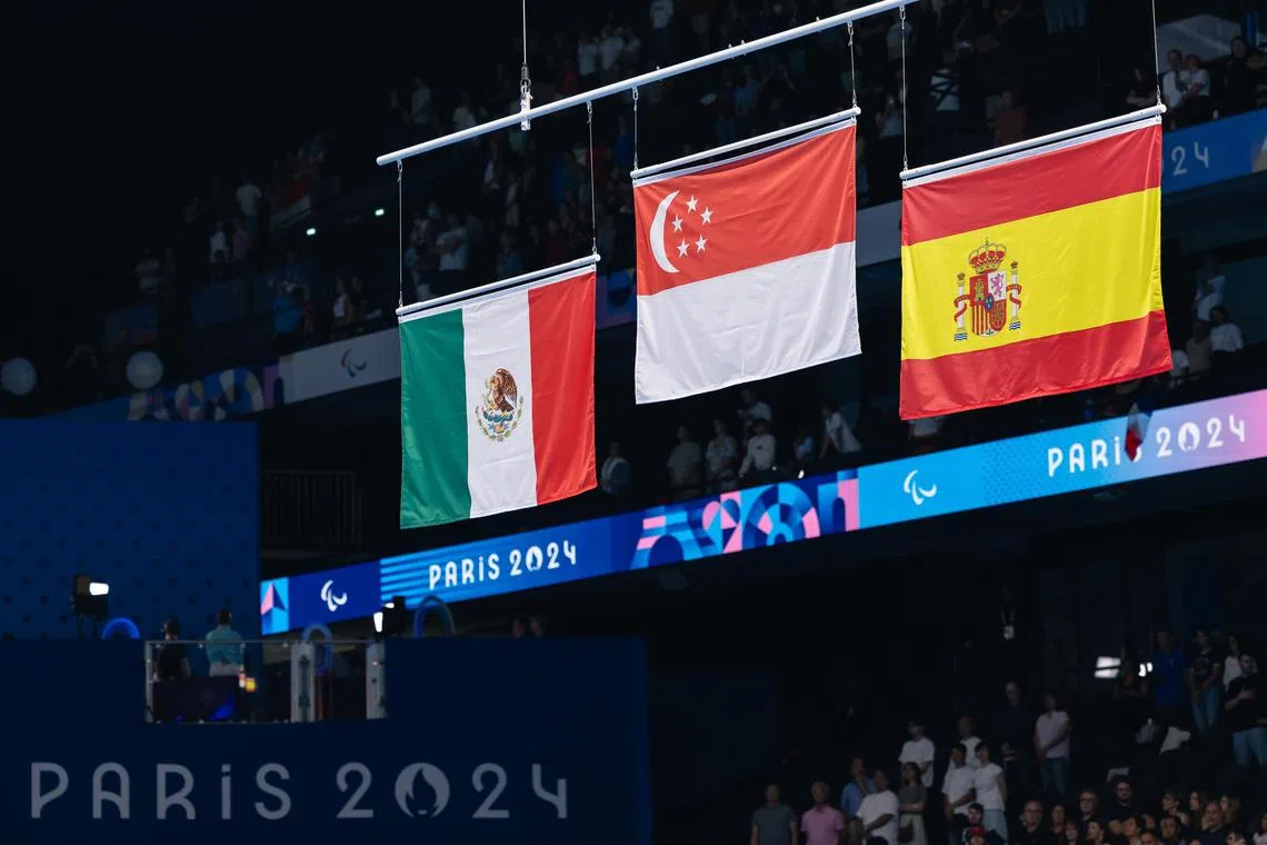 在墨西哥和西班牙泳手的追逐下，叶品秀让新加坡国旗高挂残奥赛场。（新加坡体育理事会提供）