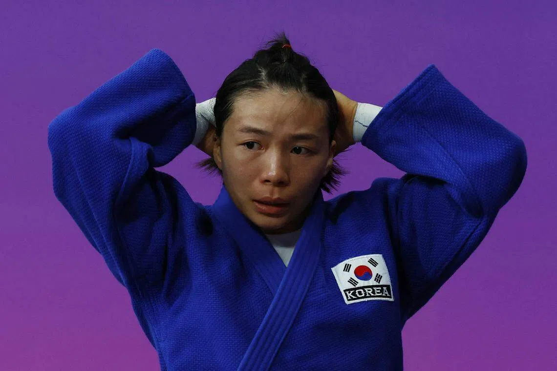 李慧卿被判落败后，感到相当沮丧。（路透社）
