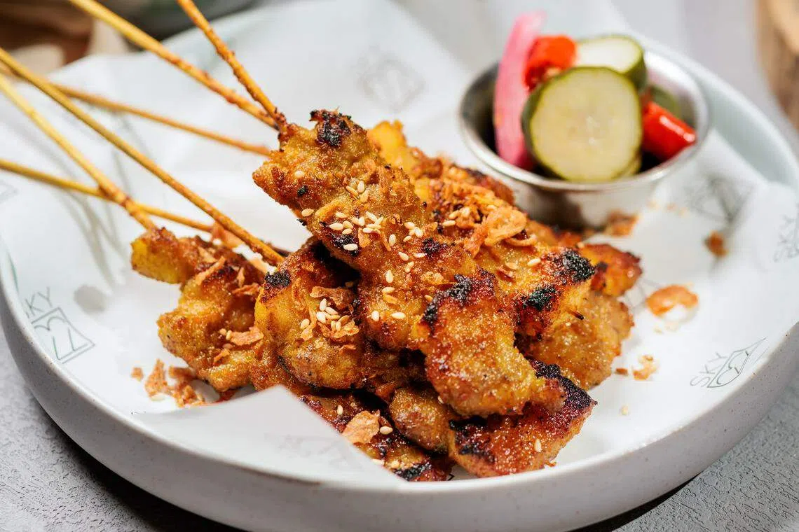 Satay Bohong以西班牙黑猪肉做成沙爹。（餐馆提供）