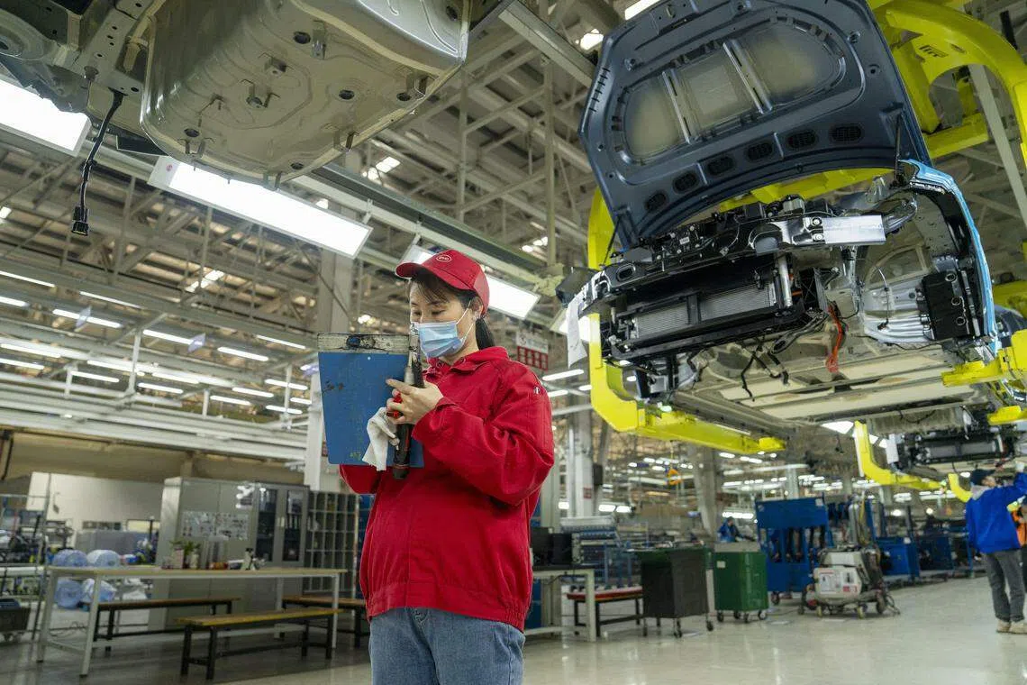 中国汽车公司比亚迪（BYD）已打入欧洲和拉丁美洲市场。照片为比亚迪在常州工厂的生产线。（法新社）