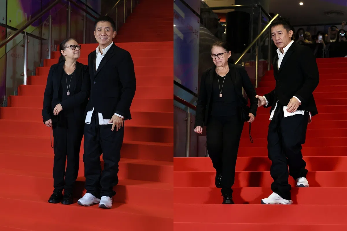 梁朝伟（左图右，右图右）与导演Ildiko Enyedi下楼时，全程扶着对方，尽显绅士风度。（龙国雄摄）