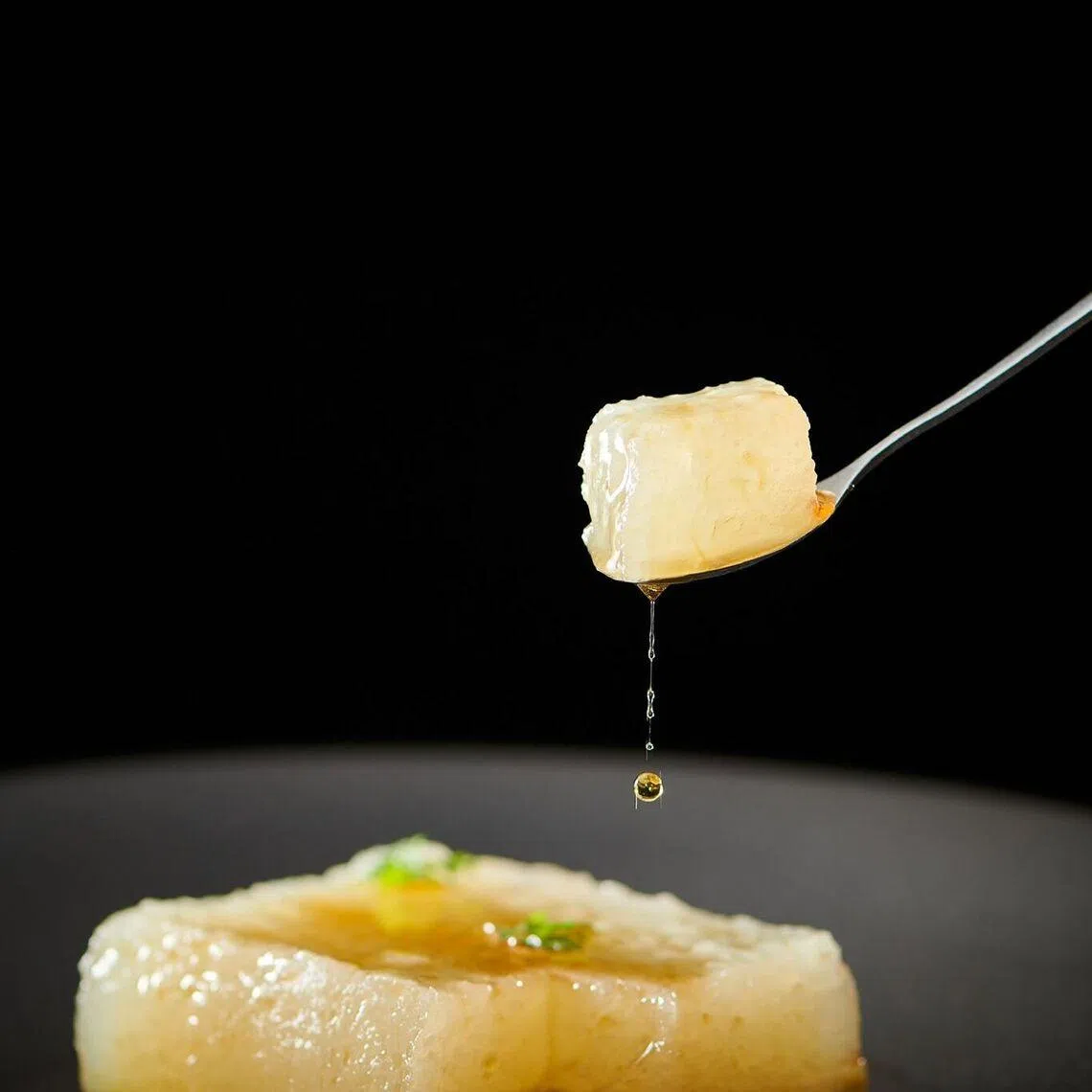 香油腌冬瓜，经改良保留自然酸香，采用自然发酵而成。（餐馆提供）