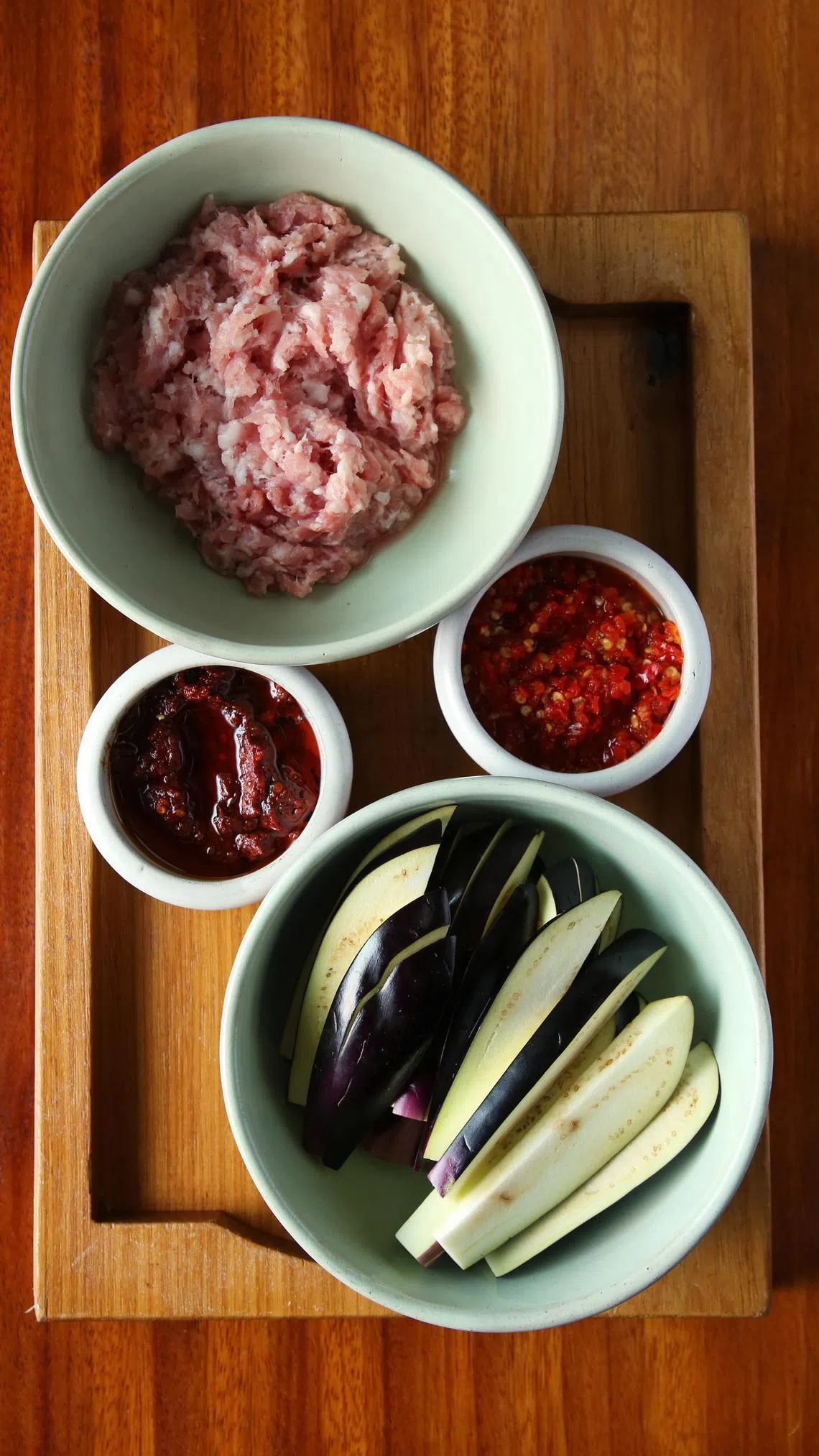 鱼香茄子用泡椒和泡姜等食材调制而成。（李姿仪摄）