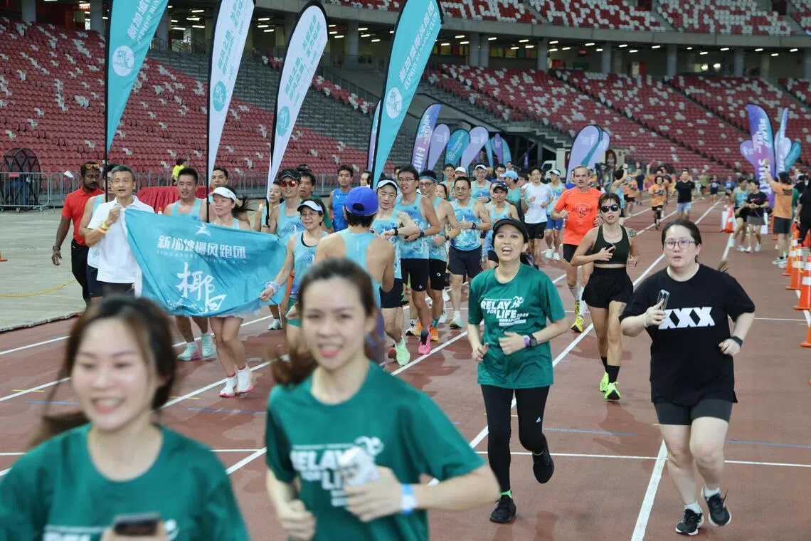 Image 16: “为生命接力”由新加坡防癌协会举办，今年已是第10届，共吸引6000多名参与者，人数创历年之最。今年活动也为癌患社群筹集136万元善款。（梁麒麟摄）
