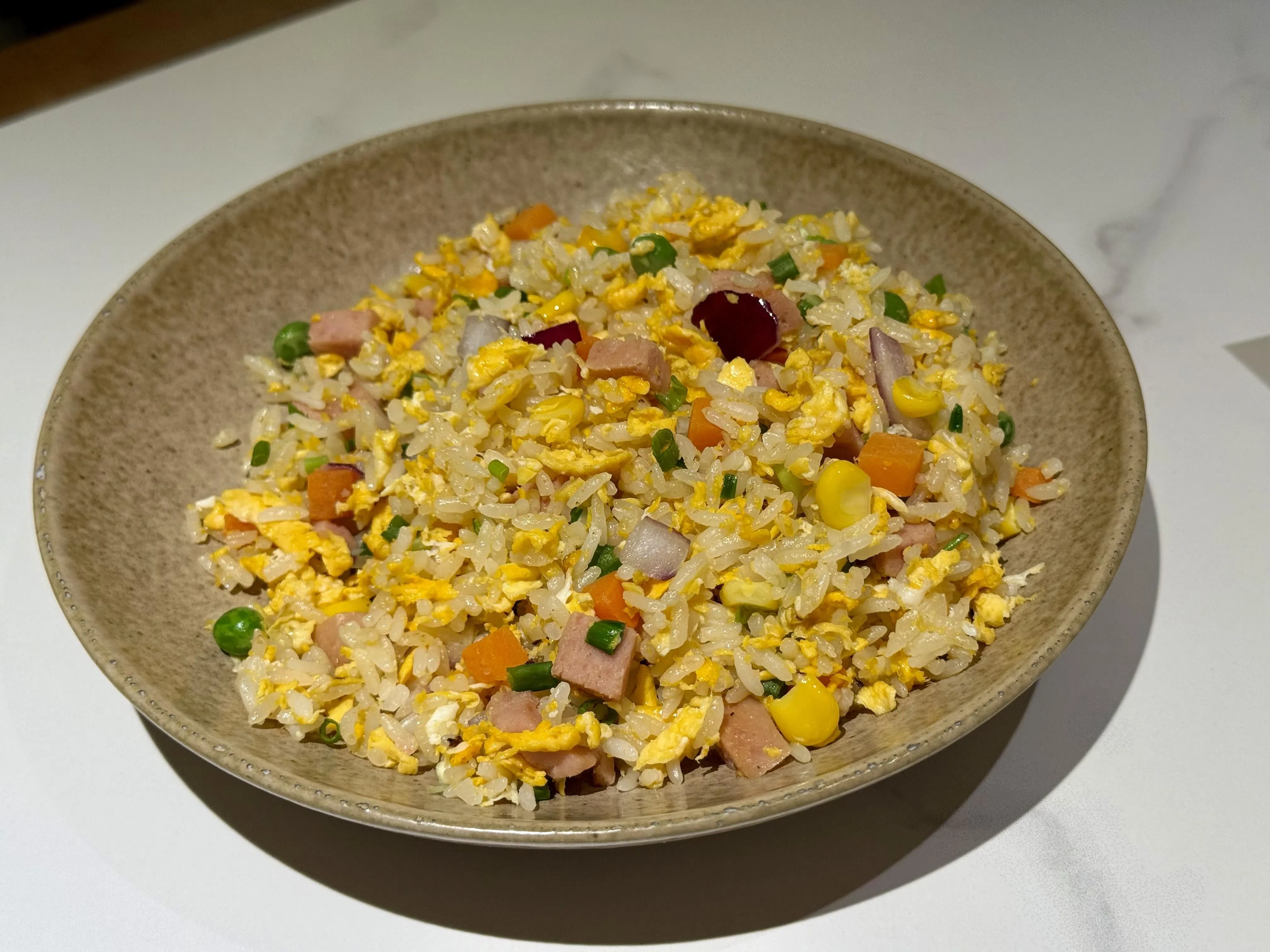 扬州炒饭色泽鲜艳。（叶晓虹摄）