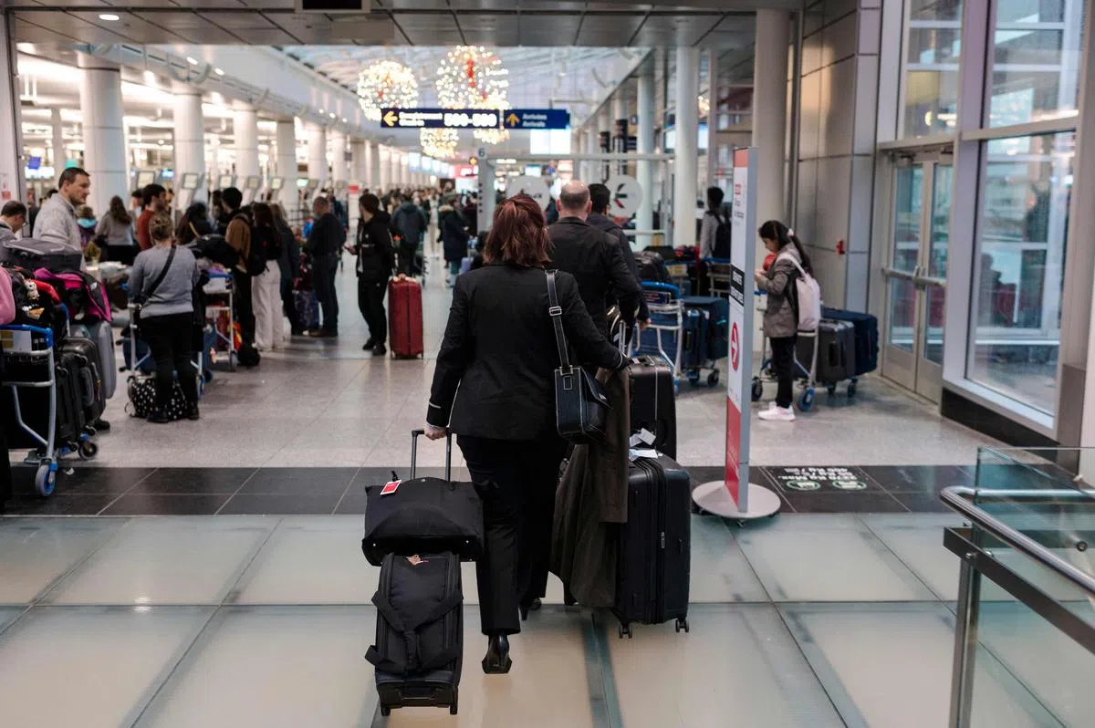 加拿大除了要求中国旅客提供检疫证明外，也将针对多伦多和温哥华机场落地的国际航班进行污水。图为加拿大蒙特利尔皮埃尔·埃利奥特·特鲁多国际机场。（法新社）