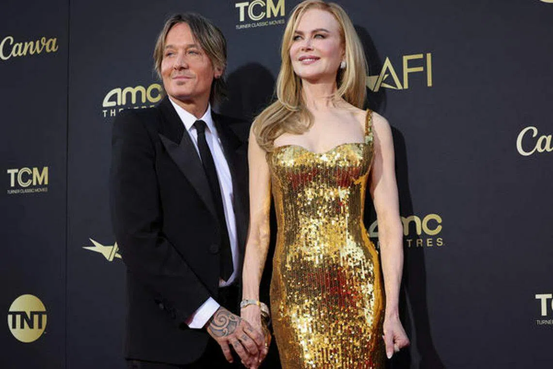 Nicole Kidman在老公Keith Urban陪伴下出席颁奖礼。（路透社）