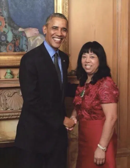 崔丽杰（右）曾与美国前总统奥巴马合影。（互联网）